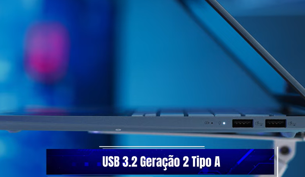 Vista lateral do ASUS Vivobook S 14, destacando as portas USB 3.2 e detalhes do dispositivo.